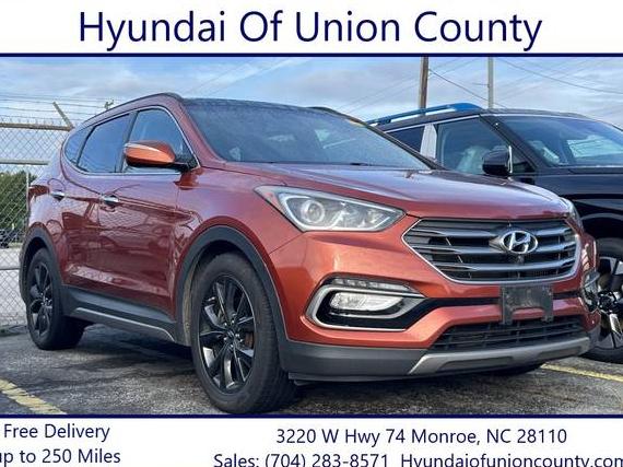 HYUNDAI SANTA FE 2017 5XYZWDLA1HG386662 image